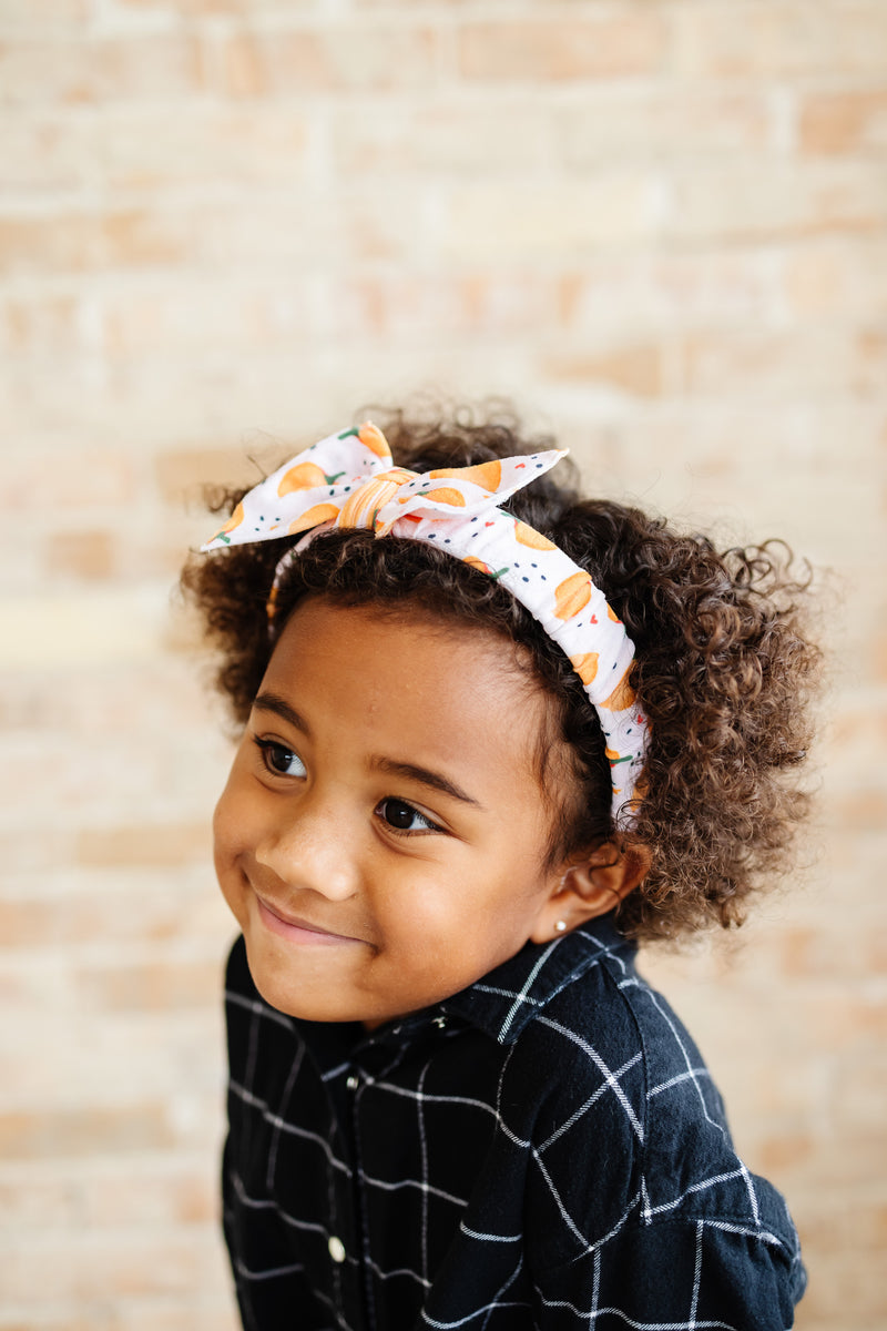 PRINTED TIED HARD HEADBAND: pumpkin